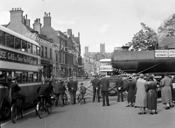 CATHEDRAL FROM HIGH STREET LEVEL CROSSING GATE  GAS ADVERT